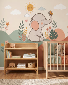 Fresque murale Bibou en gros plan derrière l'étagère en rotin : papier peint chambre de bébé sur mesure Wonderwall