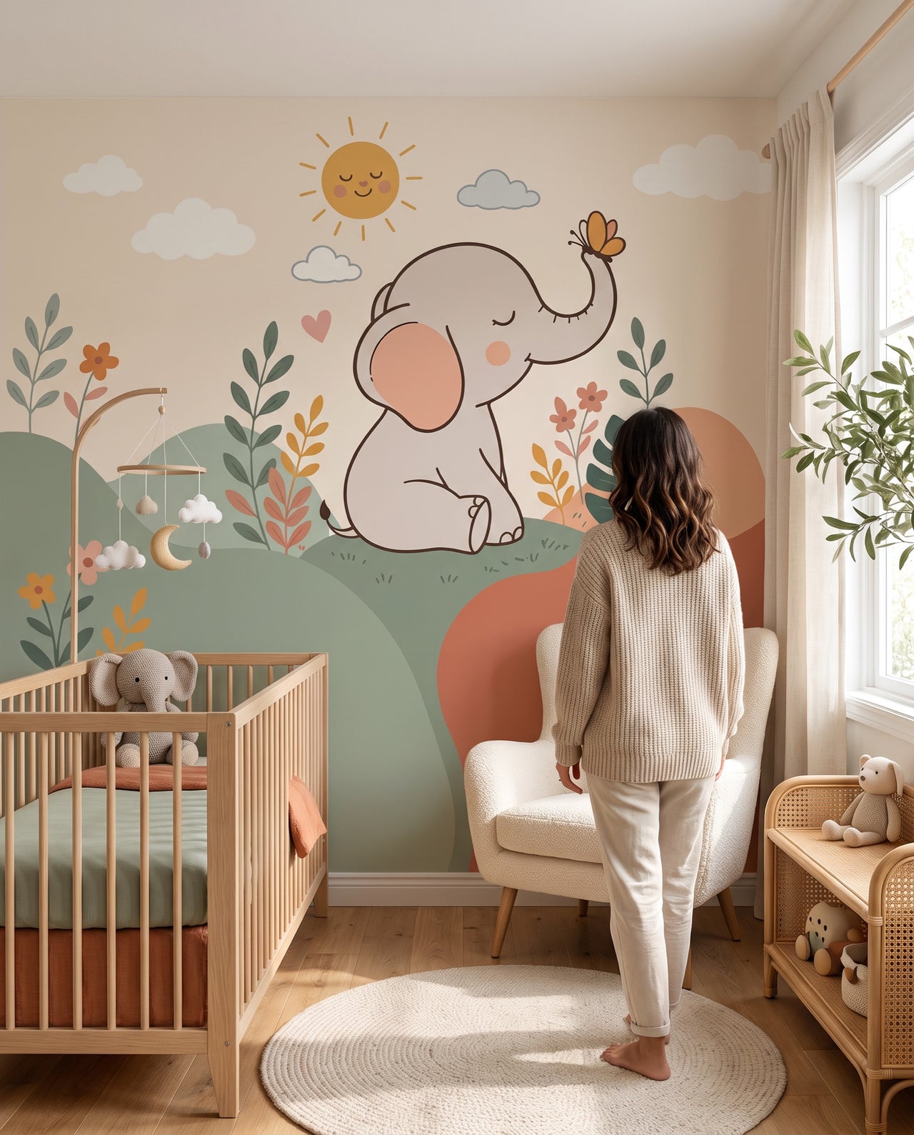 Fresque murale Bibou dans une nursery, une maman berce son bébé : décor éléphant sur mesure au Maroc, Wonderwall